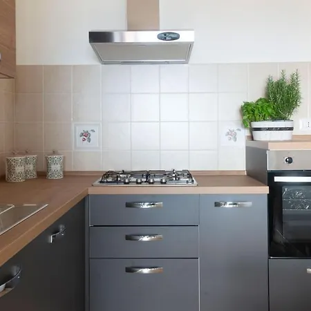 Апартаменты La Terrazza In Centro Доргали